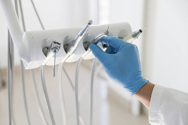 Professional Tooth Extraction technician working in Ossian, IN